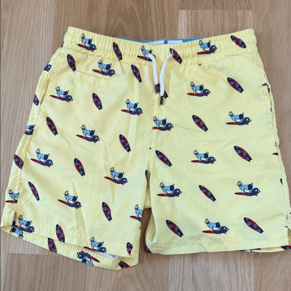 Yellow Kids Swim Trunks with Surfboard Print